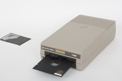 Commodore 1541 with a Maxell brand floppy disk.
